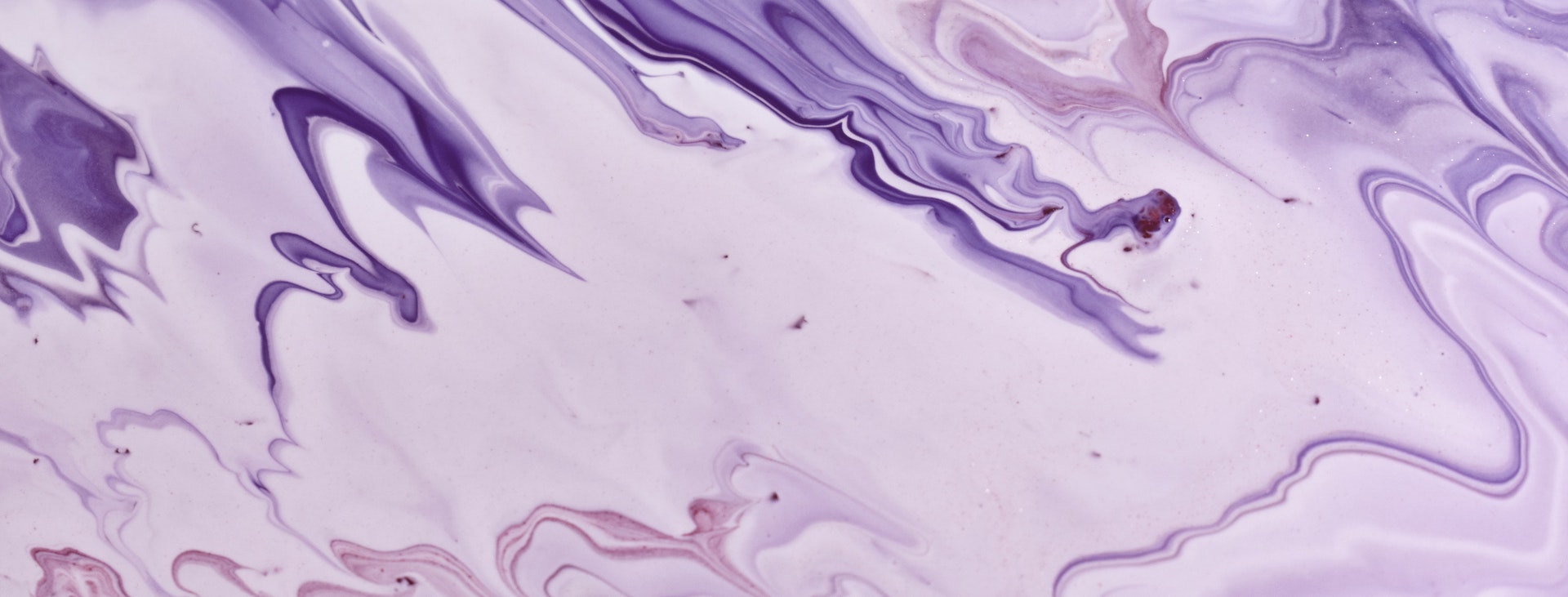 Purple abstract paint swirl